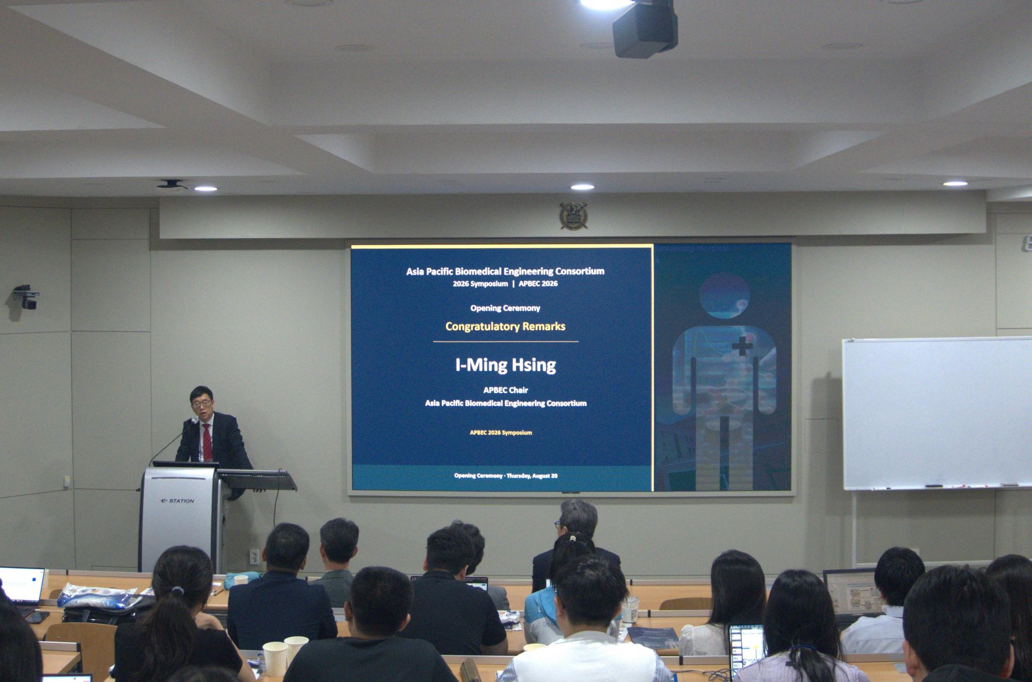 APBEC 2026 opening ceremony slide announcing congratulatory remarks by I-Ming Hsing